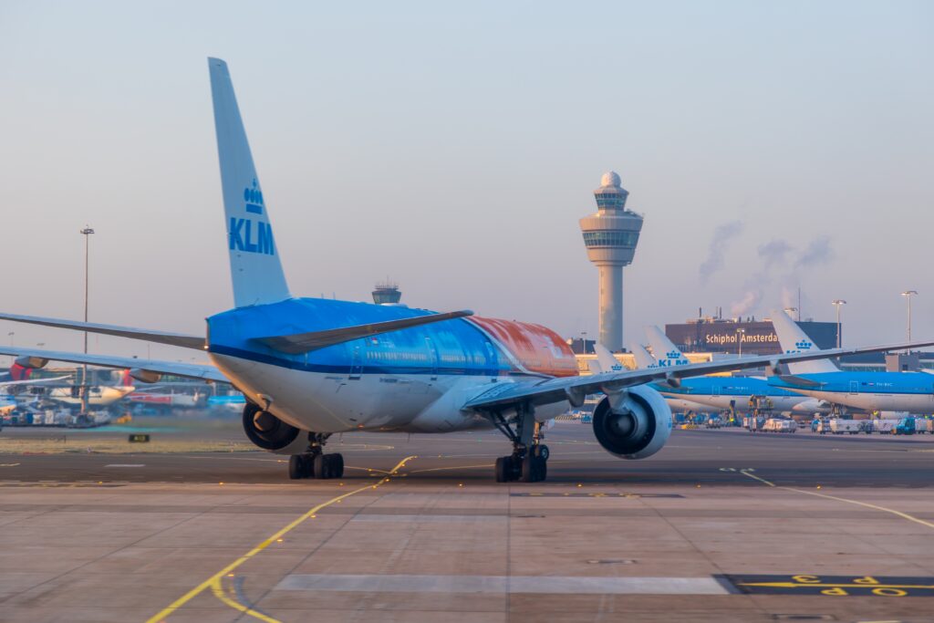 a klm boeing 777 taxiing at amsterdam schiphol airport