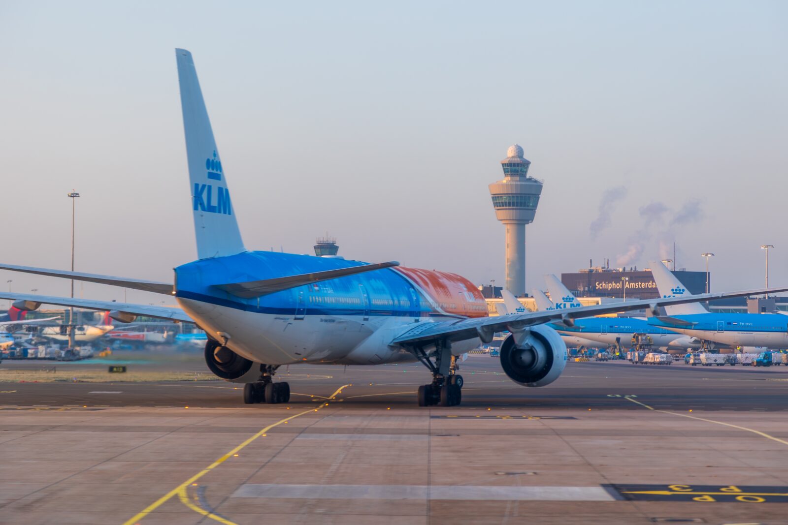 a klm boeing 777 taxiing at amsterdam schiphol airport