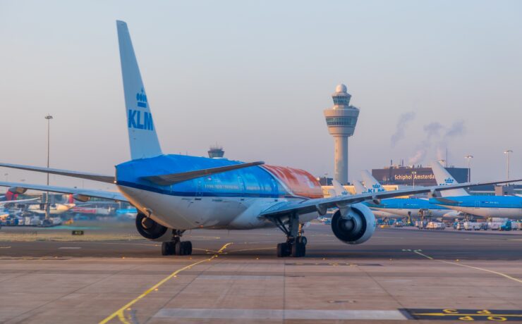 a klm boeing 777 taxiing at amsterdam schiphol airport