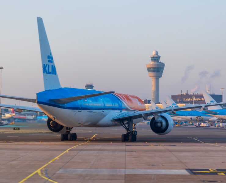 a klm boeing 777 taxiing at amsterdam schiphol airport