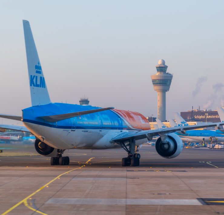 a klm boeing 777 taxiing at amsterdam schiphol airport