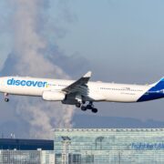 a discover airlines airplane landing at frankfurt airport