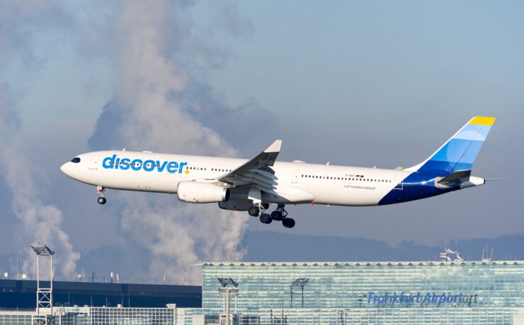 a discover airlines airplane landing at frankfurt airport