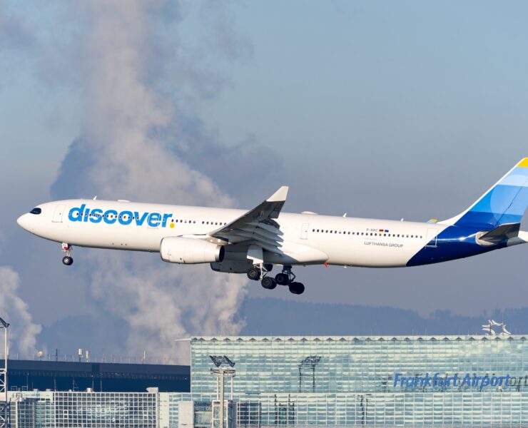 a discover airlines airplane landing at frankfurt airport