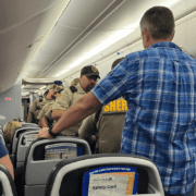 police board a united airlines plane that declared an unruly passenger incident
