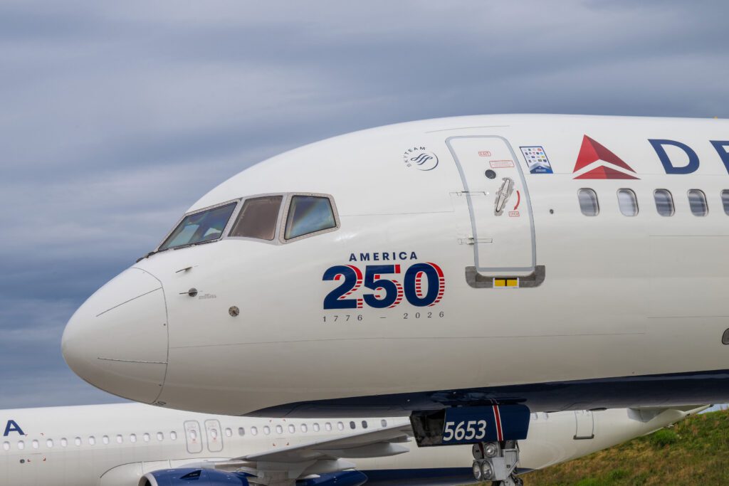 a delta air lines Boeing 757 with a 250 decal
