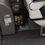 two trays of drinks left on floor of plane