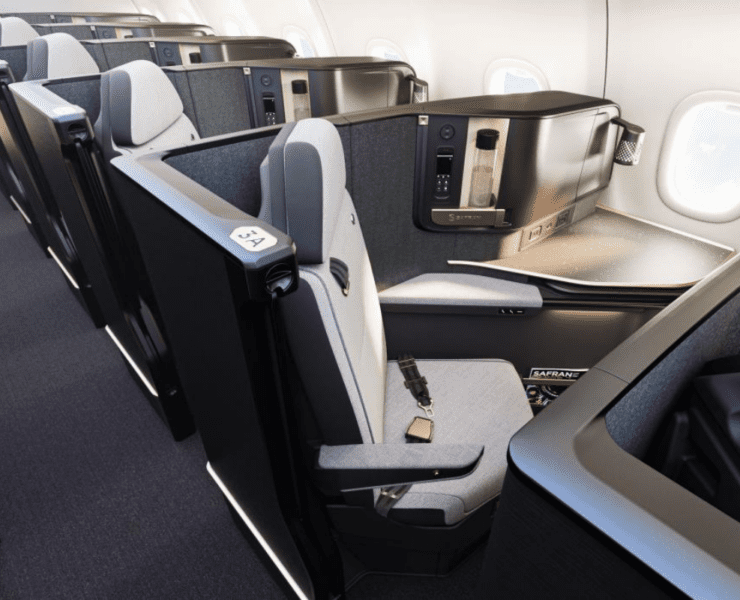 a rendering of an airplane cabin featuring the Safran Vue business class seat