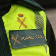 a close up of a guardia civil officer