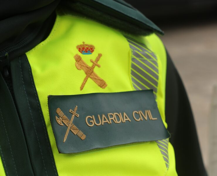 a close up of a guardia civil officer