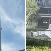 image of a small plane that has crashed into a skyscraper in Beijing