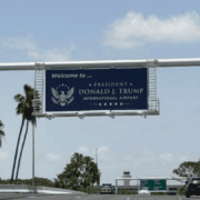 DJT Airport road sign