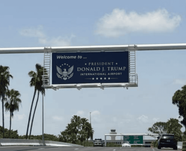 DJT Airport road sign