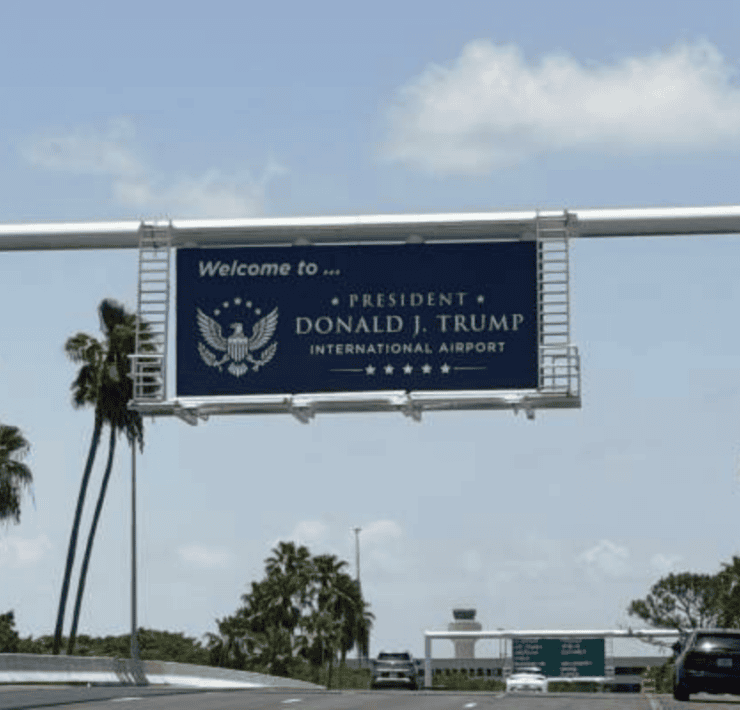DJT Airport road sign