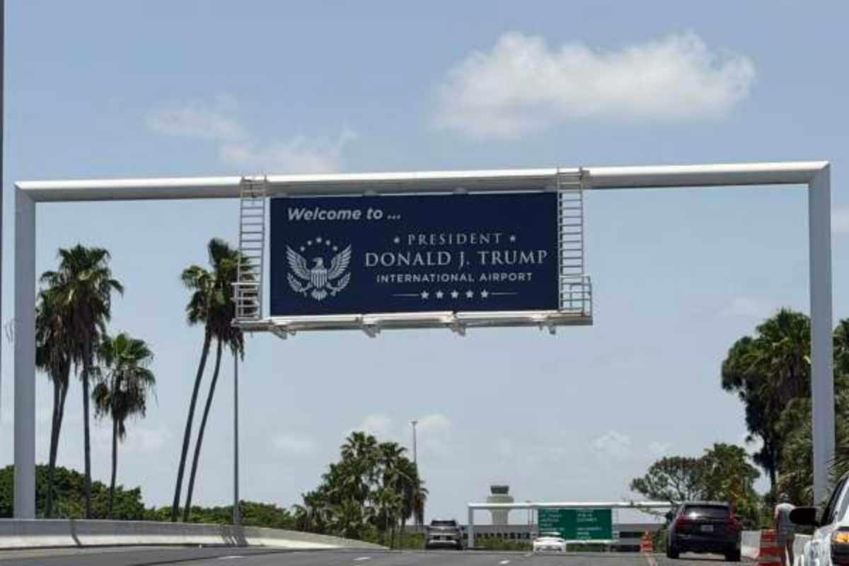 DJT Airport road sign