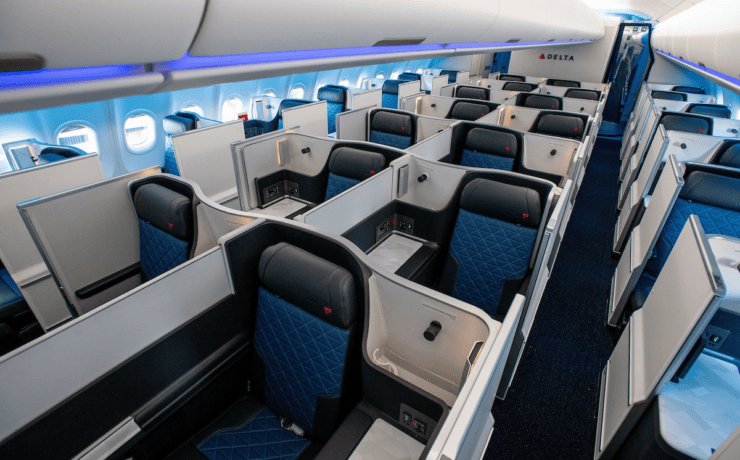 a row of seats in Delta One