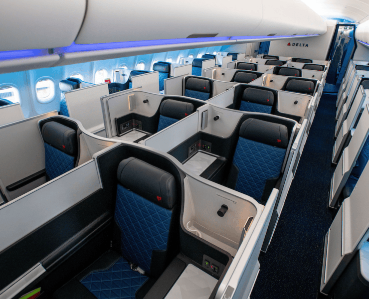a row of seats in Delta One