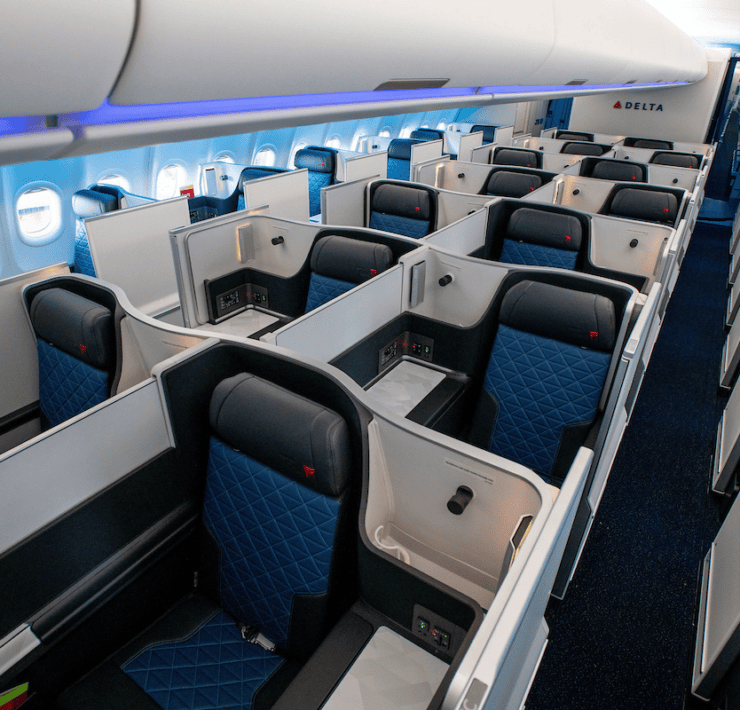a row of seats in Delta One