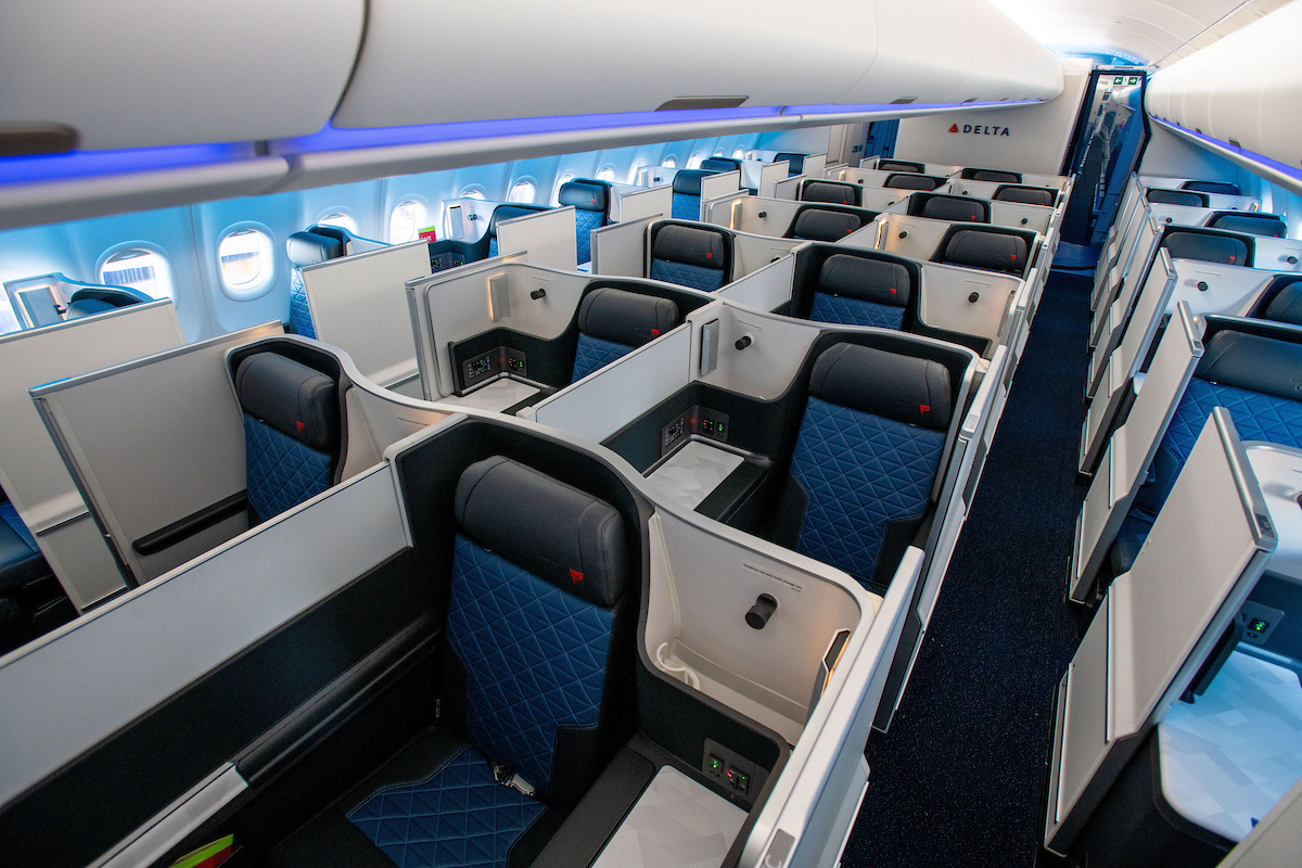 a row of seats in Delta One