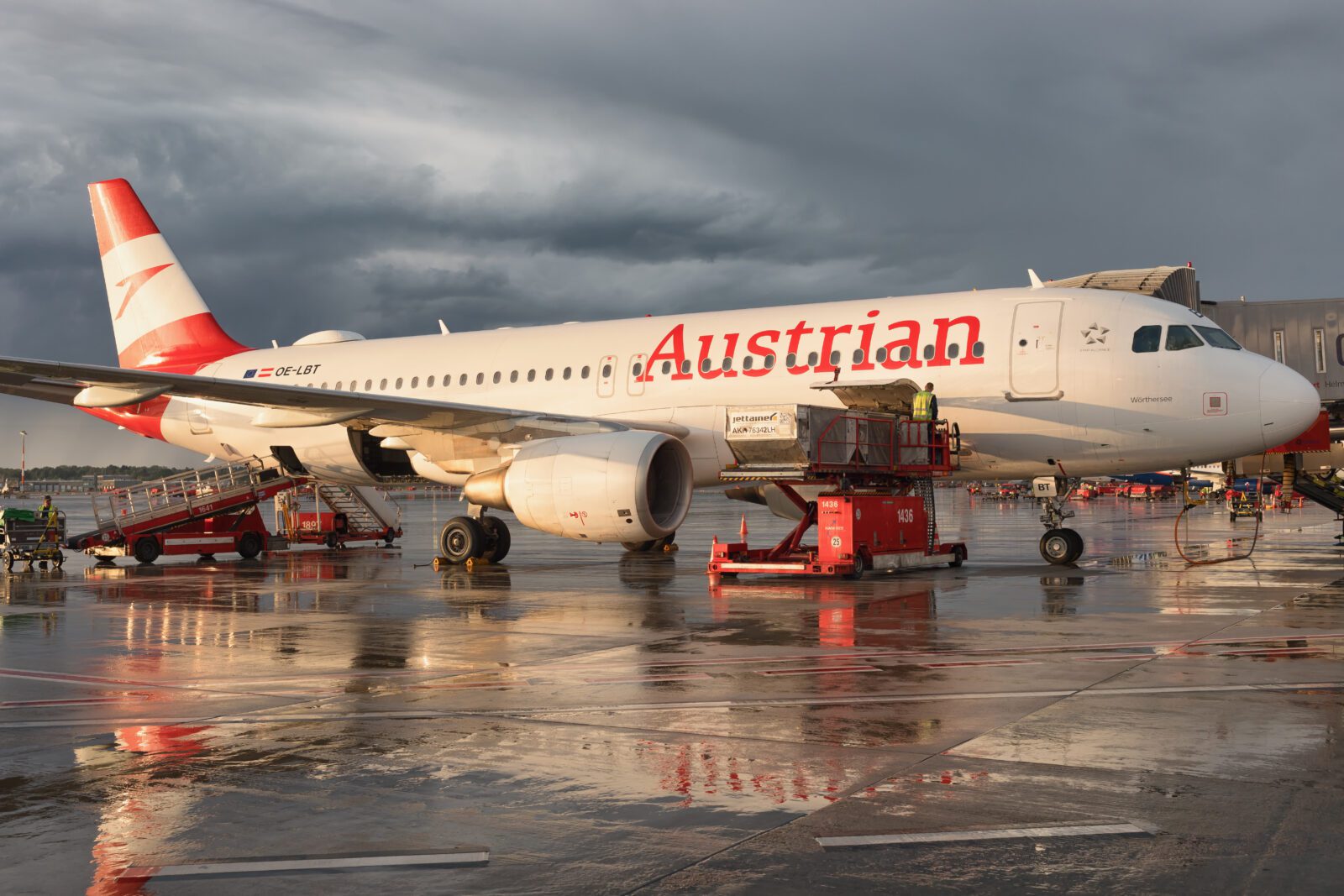 an austrian airlines airbus a320 at the gate