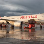 an austrian airlines airbus a320 at the gate