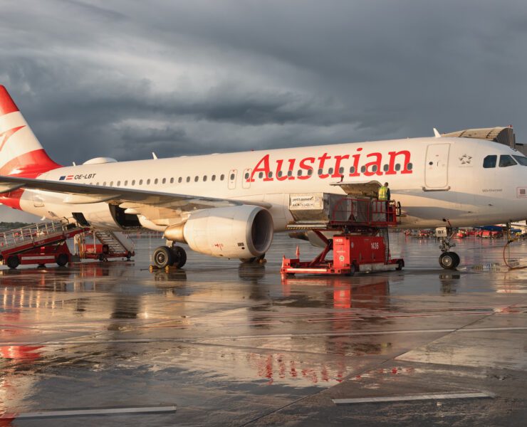 an austrian airlines airbus a320 at the gate