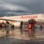 an austrian airlines airbus a320 at the gate