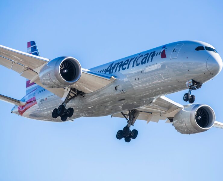 an american airlines boeing 787-9 dreamliner flying in the sky