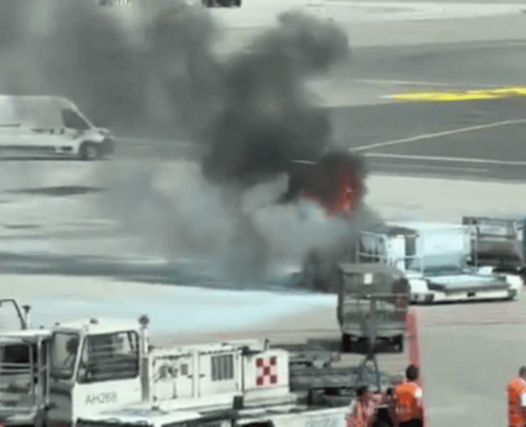 screenshot of video showing a fire in a luggage container at milan malpensa airport