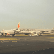 a jetstar plane and a qatar airways plane at sydney airport