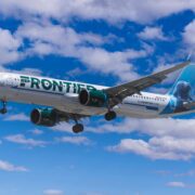 a frontier airlines airbus a321 flying in the sky