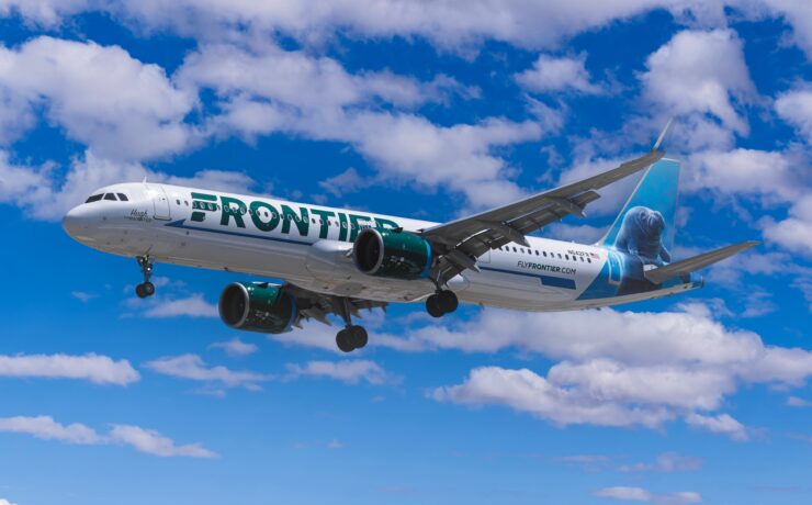 a frontier airlines airbus a321 flying in the sky