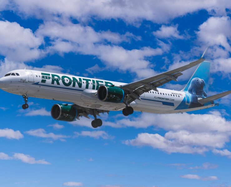 a frontier airlines airbus a321 flying in the sky