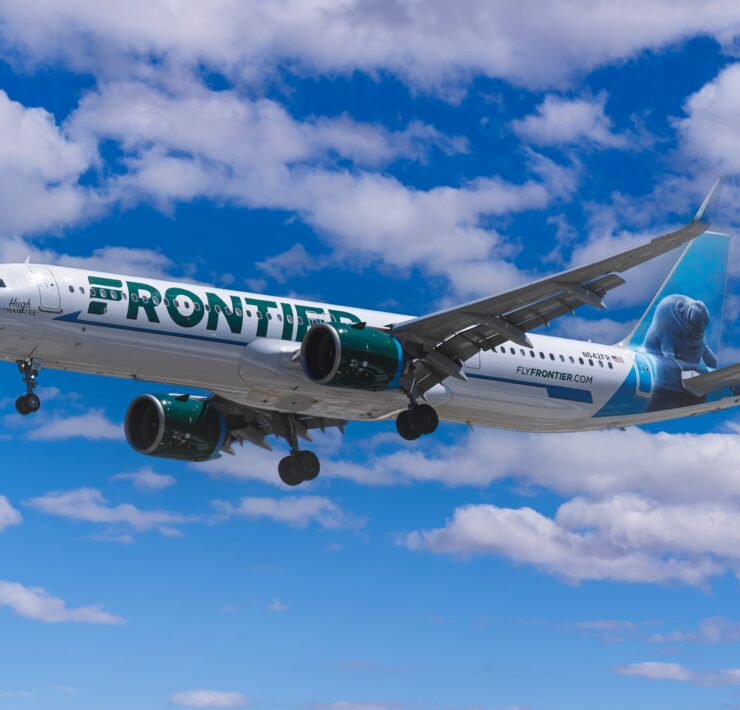 a frontier airlines airbus a321 flying in the sky