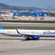 a jetblue airplane at barcelona airport