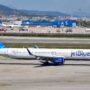 a jetblue airplane at barcelona airport